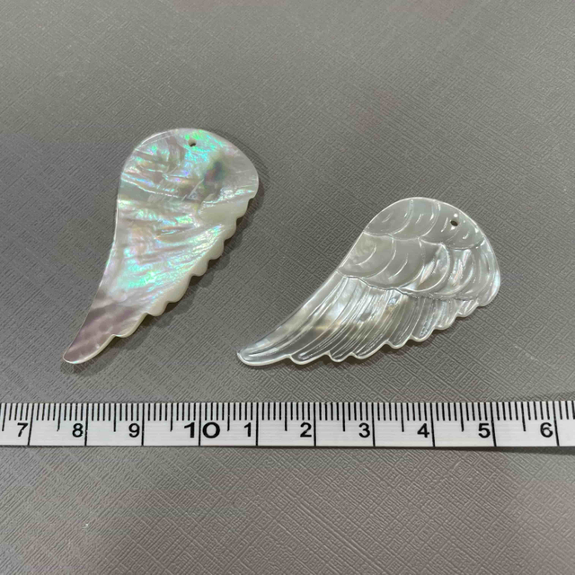 Natural Mother of pearl wing cutting jewelry pendant design big size feather shape face carving for DIY making white shell wings