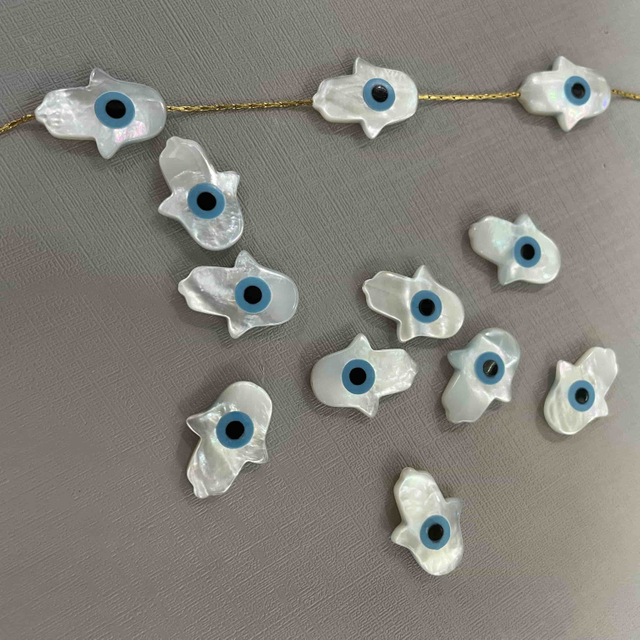 Natural Mother of pearl hand shape cutting evil eyes necklace design making fatima hands for chain using small beads design